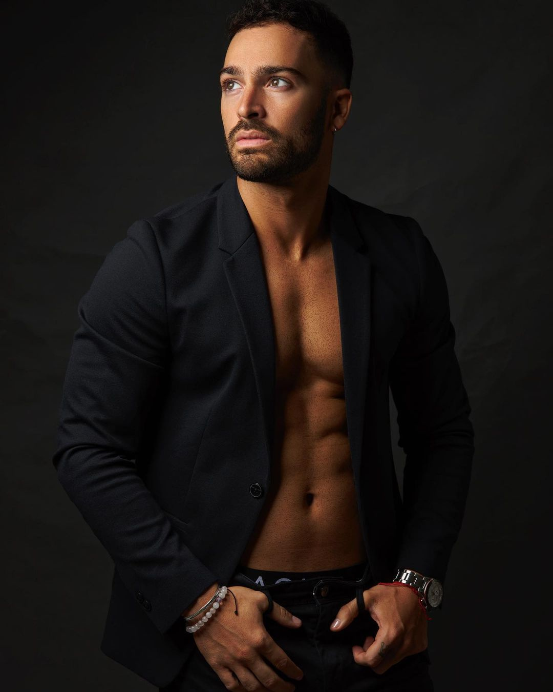 CARLOS J. TORRES